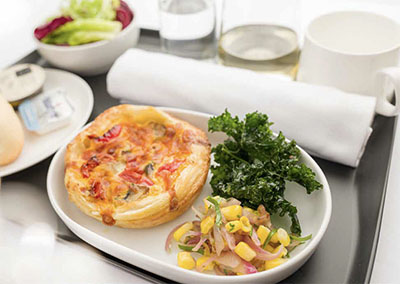 Qantas Airways meal of tomato and mushroom puff pastry tart with corn salsa 