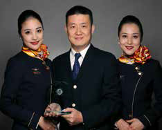 Ouyang Chen, deputy service general manager, Hainan Airlines; Hainan Airlines flight attendants