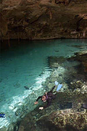 Snorkeling in a cenote in Riviera Maya