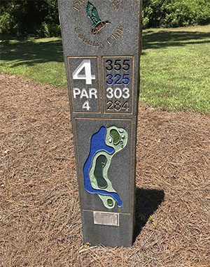 Hole 4 signage showing the water hazard © FRANCIS X. GALLAGHER