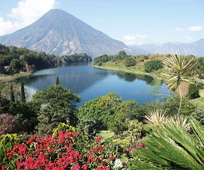 The volcano-ringed Lake Atitlan in the Highlands