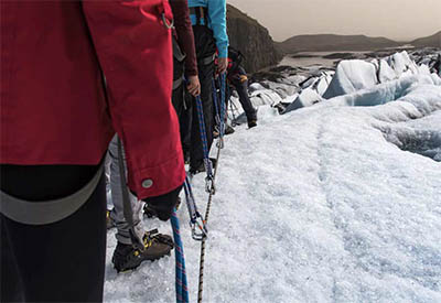 A group of people lined up for climbing