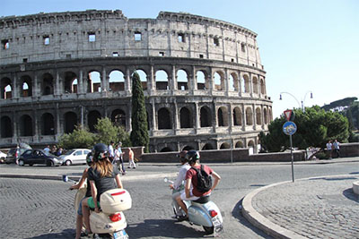 Exploring the Eternal City on Vespa scooters on a Discover Your Italy tour in Rome