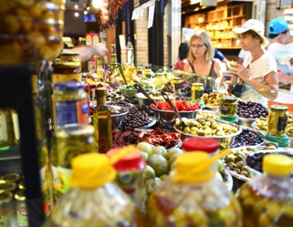 Assortment of marinated olives at a stall in Sarona Gastro Market