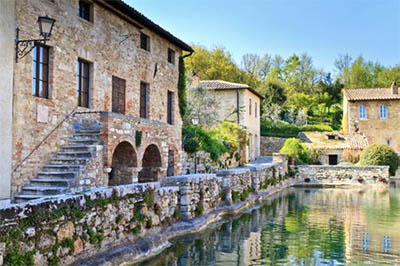 Old thermal baths in the medieval village of Bagno Vignoni